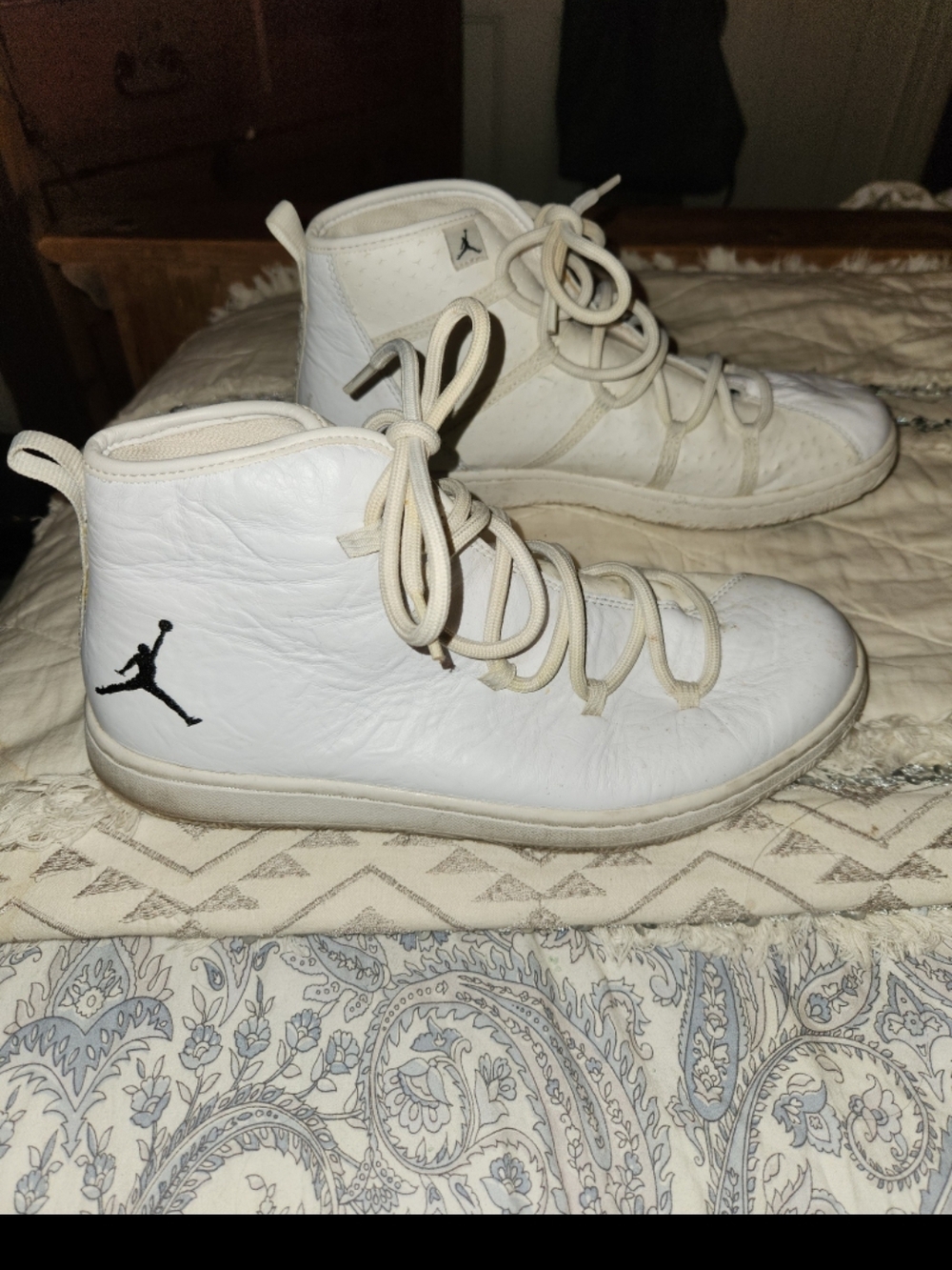 Nike White High-Top Jordan Sneakers with Black Jumpman